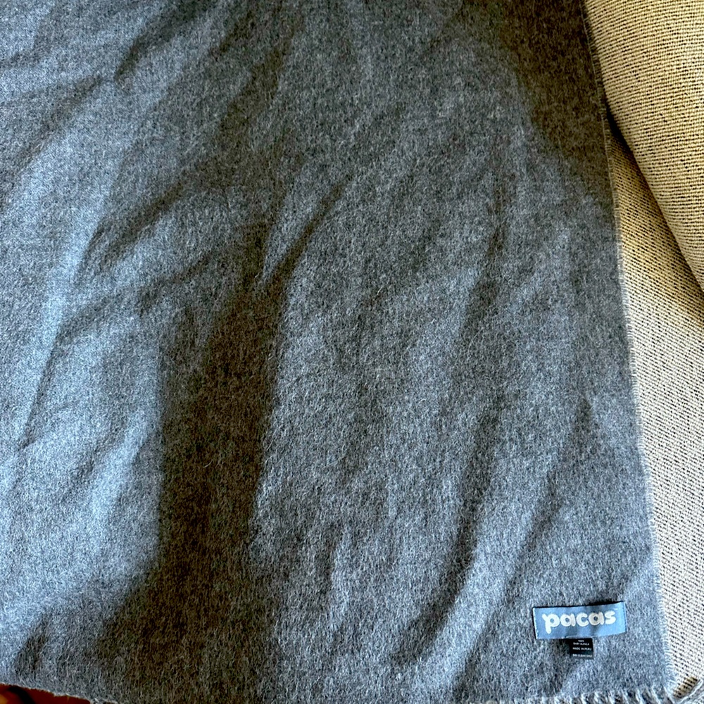 Pacas throw blanket. Made from alpacas. Soft thin and warm.